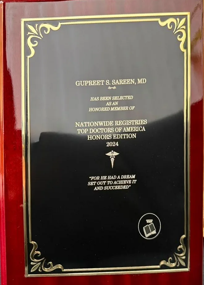 Engraved plaque: Gupreet S. Sareen, MD has been selected as an honored member of Nationwide Registries, Top Doctors of America, Honors Edition 2024.